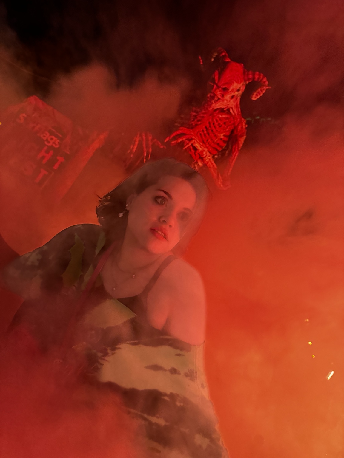 Kendall Morgan Lacy in a dramatic red-lit setting